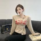Lettering Button-up Knit Top Almond - One Size