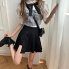 Short-sleeve Shirt / Plaid Vest / Mini A-line Pleated Skort