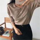 Buttoned-neck Loose-fit Knit Top