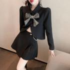 Ribbon-accent Puff-sleeve Crop Shirt / High-waist Pleated Mini Skirt