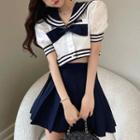 Short-sleeve Sailor Collar Bow Crop Top / Pleated Mini A-line Skirt / Set