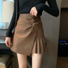 High-waist Twisted Asymmetric Pleated Skirt