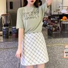 Set: Elbow-sleeve Letter T-shirt + Plaid A-line Mini Skirt