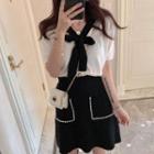 Short-sleeve Plain Knit Top / High-waist Faux Pearl Accent Skirt