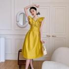 Sleeveless Ruffled Butterfly Cutout A-line Dress