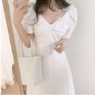 Short-sleeve Twist V-neck Midi A-line Dress