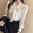 Long-sleeve Faux Pearl Tie-neck Blouse