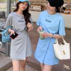 Set: Short-sleeve Lettering T-shirt + High-waist Asymmetric Plain Skirt