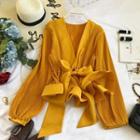 V-neck Tie-strap Ruffle Hem Blouse