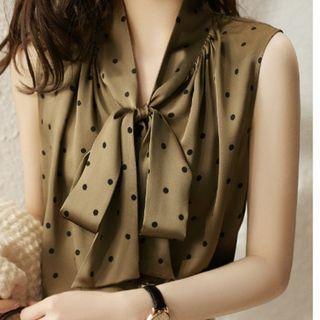 Sleeveless Dotted Tie-neck Blouse