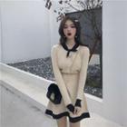 Set: Long-sleeve Color-trim Buttoned Knit Top + Mini A-line Skirt