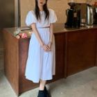 Set: Puff-sleeve Crop Top + Midi A-line Skirt