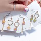 Non-matching Floral Dangle Earring