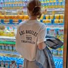 Short-sleeve Lettering T-shirt / High-waist Sweatpants