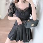 Puff-sleeve Lace Crop Top / Buckled Pleated A-line Mini Skirt