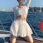 Long Sleeve V-neck Open Back Cropped T-shirt / Pleated Mini A-line Skirt