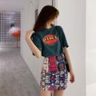 Set: Elbow-sleeve Letter T-shirt + Printed Mini Fitted Skirt
