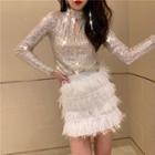 Long-sleeve Sequined Top / Fringed Mini A-line Skirt