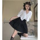 Short-sleeve V-neck Bow Crop Top / Mini A-line Skirt