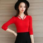 Cut Out Front Faux Pearl Long Sleeve Knit Top