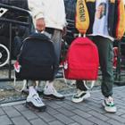 Plain Canvas Backpack With Miniature Sneakers