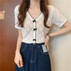 Short-sleeve V-neck Bow-accent Argyle Knit Top