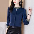 Long-sleeve Embroidered Trim Mock-neck Blouse