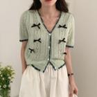 Short-sleeve Bow Accent Button-up Knit Top