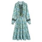 Long-sleeve Print Tasseled Tie-neck Midi A-line Dress