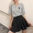 Short-sleeve Cross Applique T-shirt / A-line Skirt