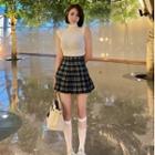 Sleeveless Turtleneck Top / Plaid Pleated Mini A-line Skirt