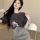Short-sleeve Cartoon Print T-shirt + Lace-up Mini Skirt