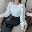 Long-sleeve Embellished Open-back Blouse