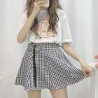 Pig Print Short-sleeve T-shirt / Checked A-line Skirt