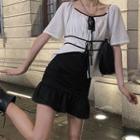 Short-sleeve Contrast Trim Drawstring Top / High-waist Ruffled Slim Fit Skirt