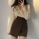 Plain V-neck Sweater / High-waist Asymmetrical Mini Skirt