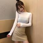 Long-sleeve Knitted T-shirt / A-line Faux Leather Skirt