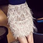 Set: Cold Shoulder Long-sleeve Knit Top + Fringed Mini Skirt