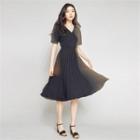 Wrap-front Pleated-hem Knit Dress With Sash