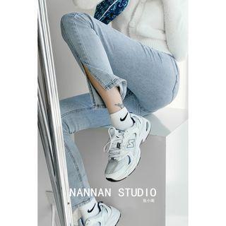Stretched Slit-hem Boot-cut Jeans