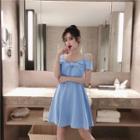 Short-sleeve Cold Shoulder Knotted A-line Mini Dress