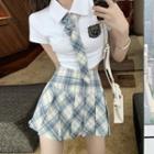 Short-sleeve Neck Tie Polo Shirt / Pleated Skirt / Set