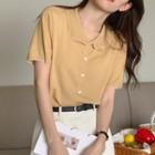 Short Sleeve Buttoned Knit Top