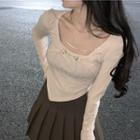 Set: Long-sleeve Mock Two-piece T-shirt + Mini Pleated Skirt