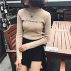 Long-sleeve Embroidered Letter Mock Neck Knit Top