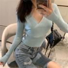 Side Buttoned V-neck Knit Top