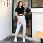 Short-sleeve Cropped T-shirt / Striped Track Pants