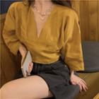 Long-sleeve V-neck Plain Cropped Blouse Curcumin - One Size