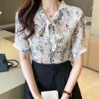 Short-sleeve Tie-neck Floral Blouse