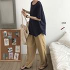 Elbow-sleeve T-shirt / Wide-leg Pants